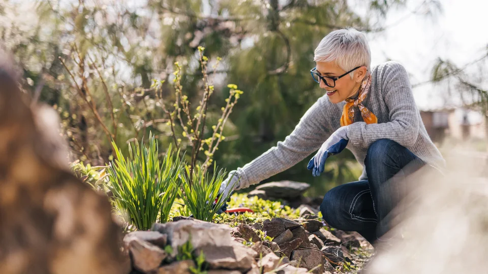 Woman enjoying gardening outdoors