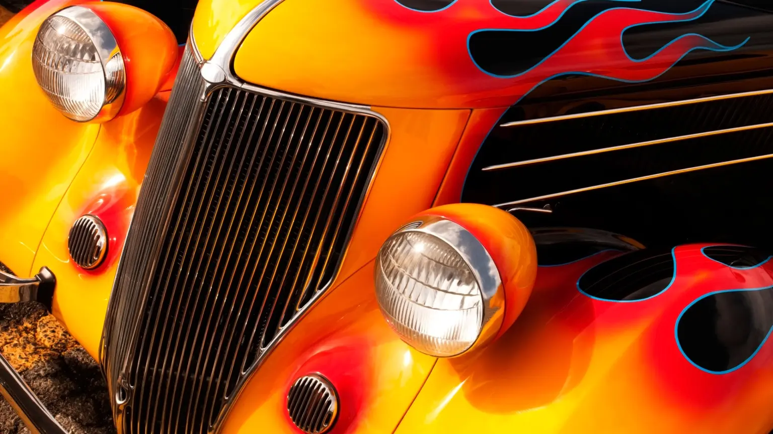 Orange classic hot rod with flame detailing
