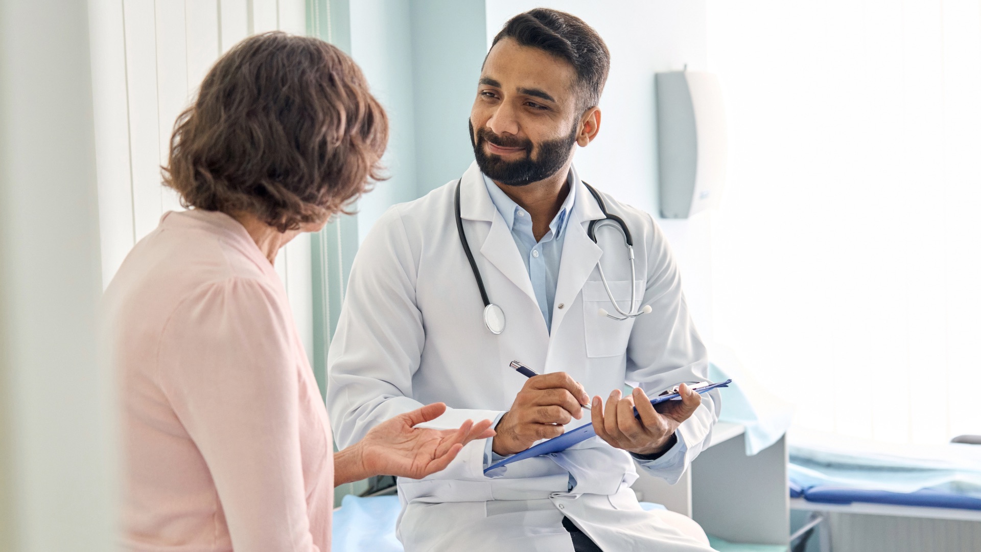 Doctor discussing care and costs with a patient