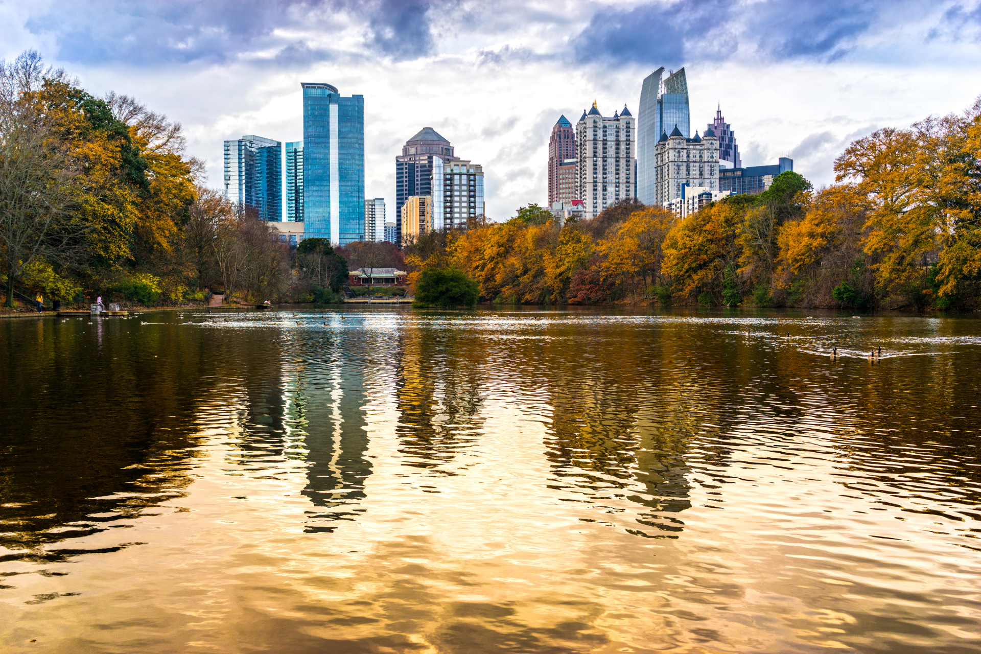 Atlanta skyline across the lake at Piedmont Park in autumn