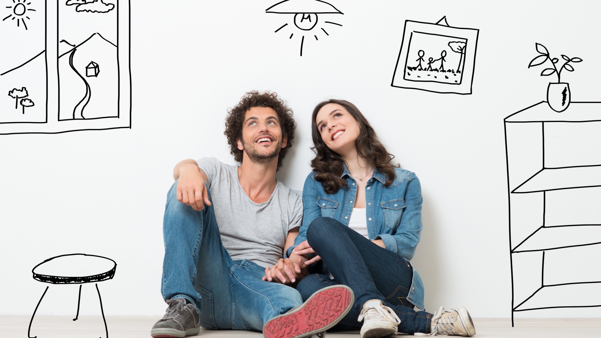 Couple imagining their future home against a hand-drawn interior