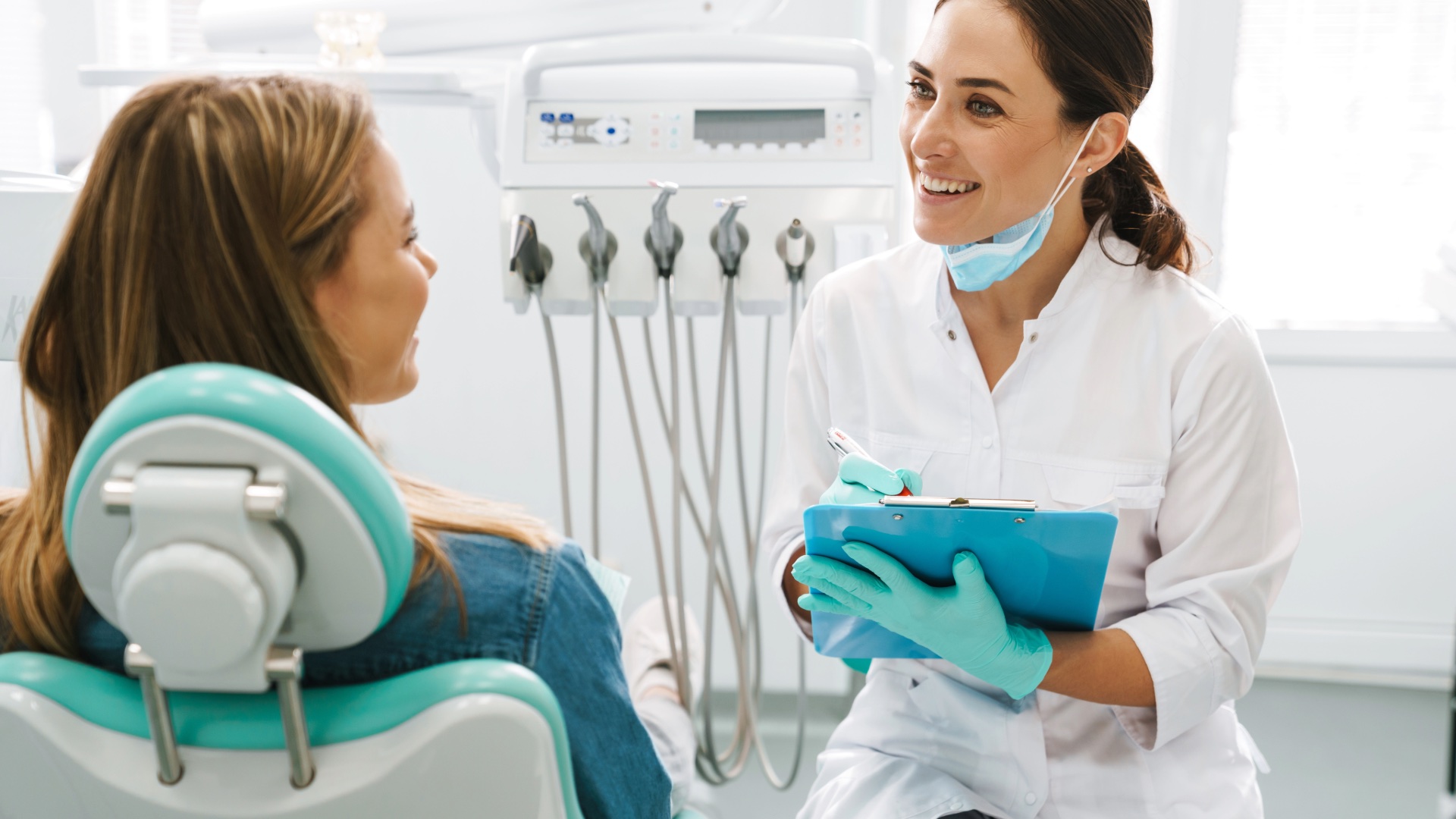 Dentist discussing care with a patient