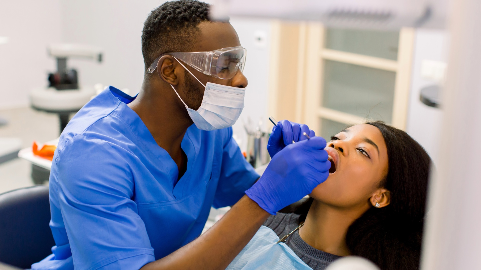 Dentist providing care during a dental visit