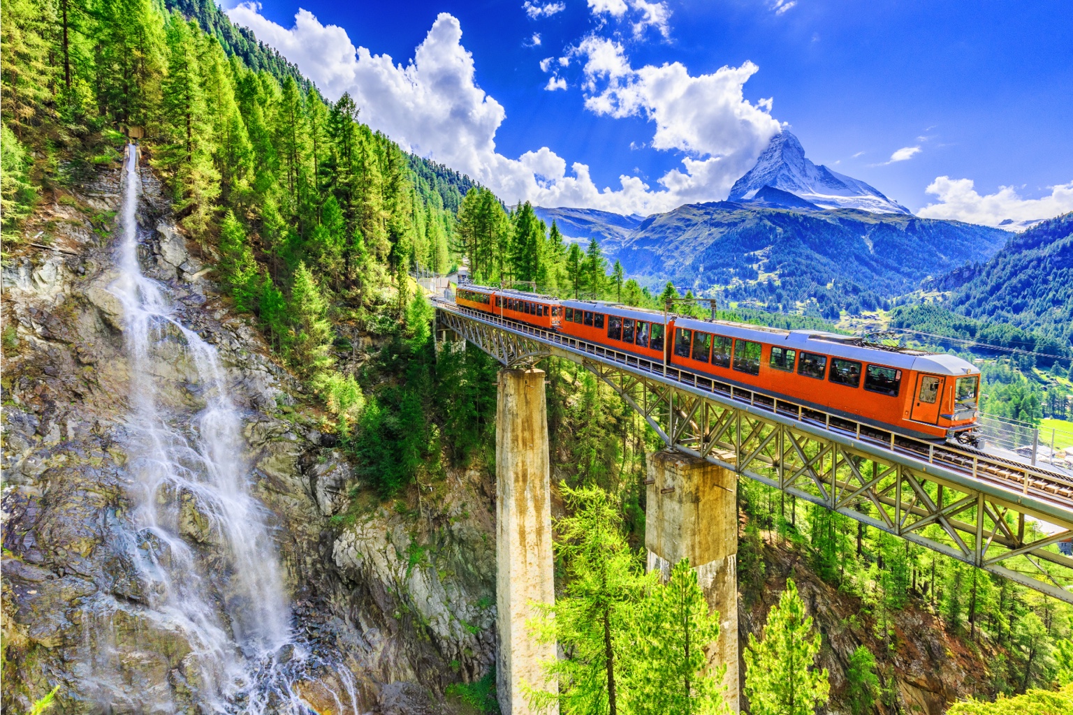 Mountain railway crossing a bridge near the Matterhorn in Switzerland