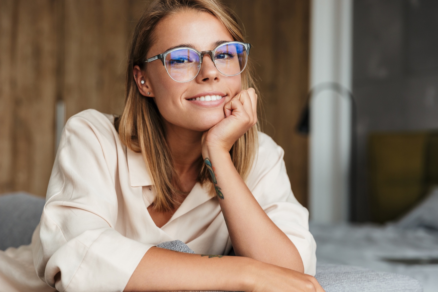 Smiling woman wearing eyeglasses